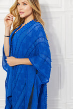 Load image into Gallery viewer, Justin Taylor Pom-Pom Asymmetrical Poncho Cardigan in Blue
